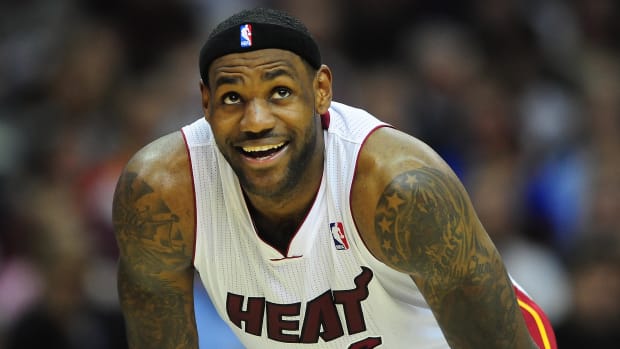 Heat forward LeBron James looks on during a game.